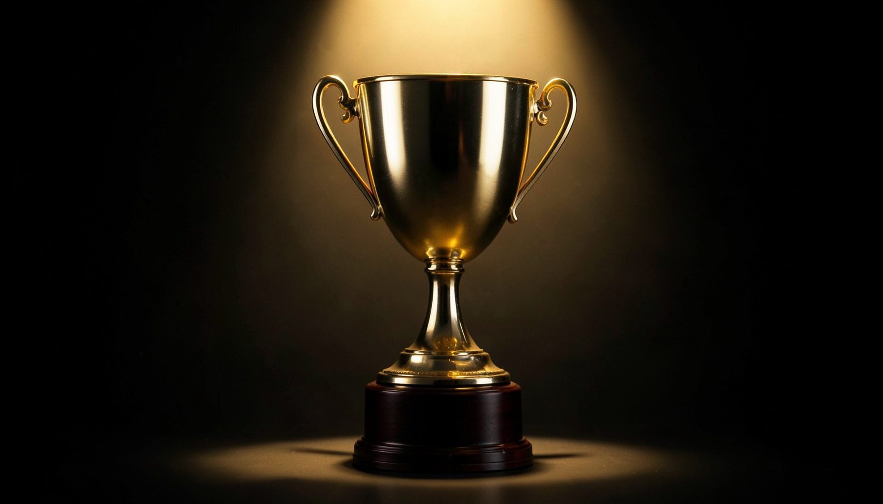 Award trophy on dark background with warm golden spotlight, ceremonial mood